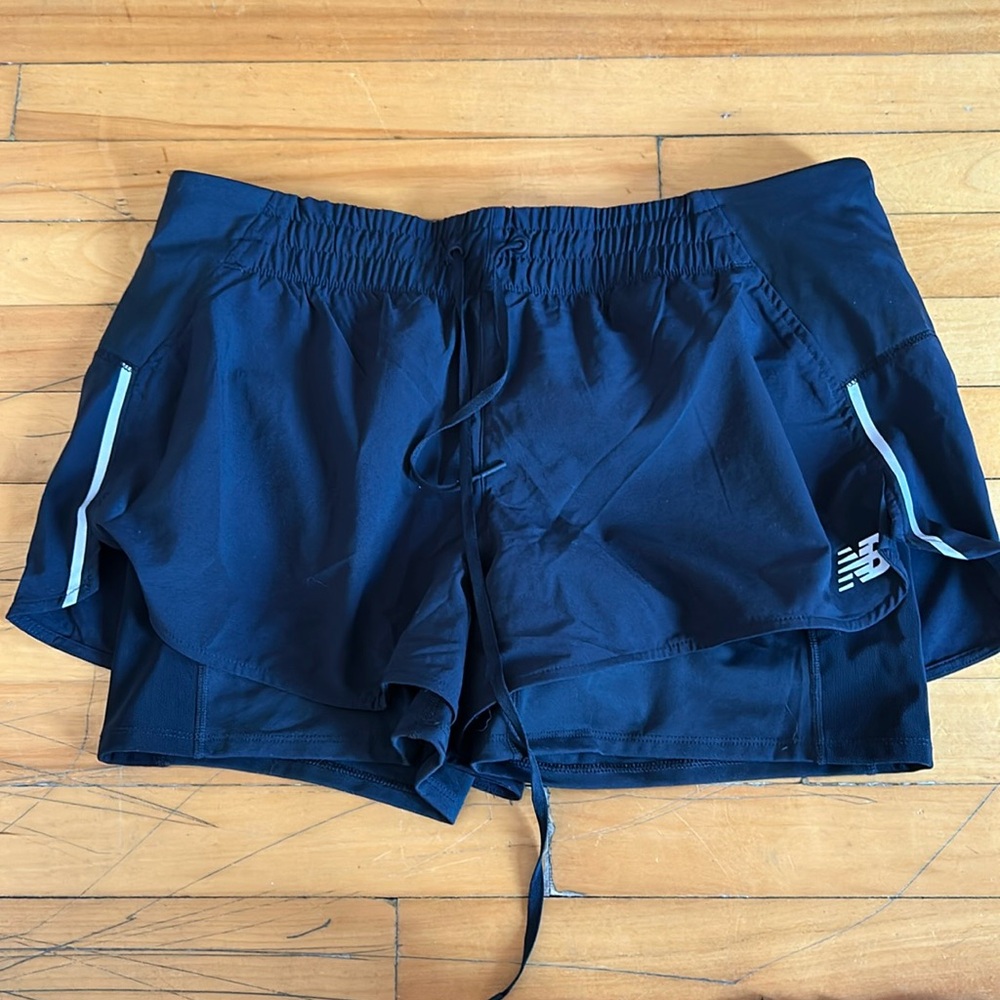 New Balance black running short